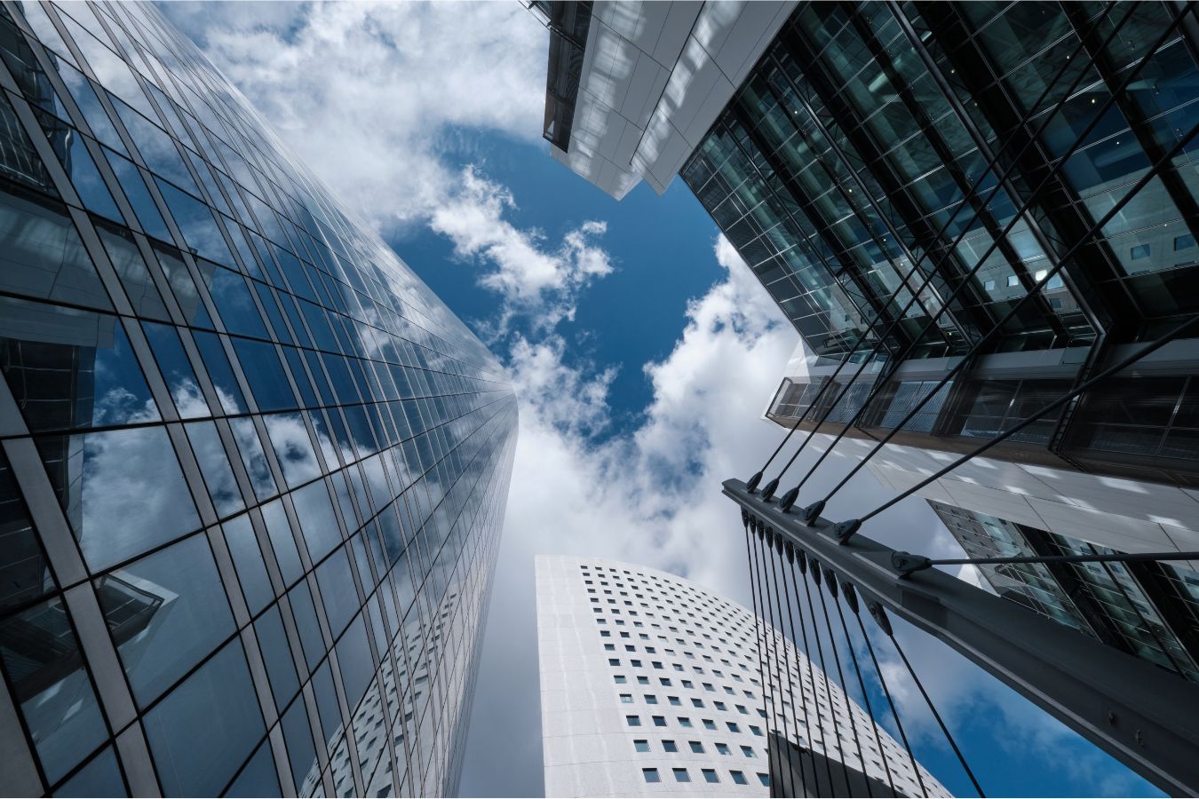 Tall buildings and blue sky with some clouds